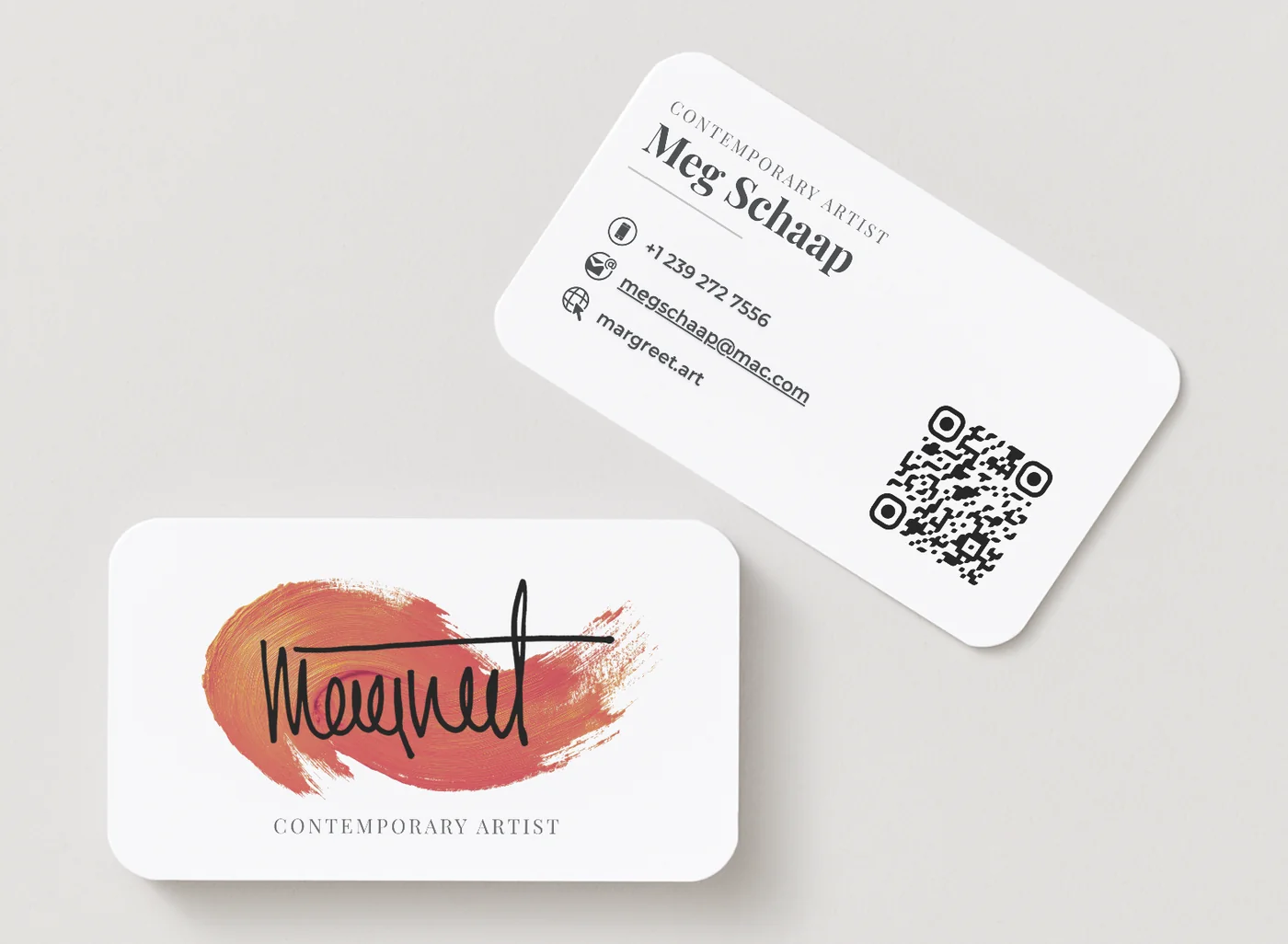 Margreet Schaap business card, front and back, the handwritten signature over a coral brushstroke, and contact details on the reverse